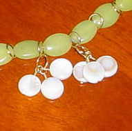 attach to beaded necklace